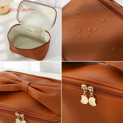 PU Soft Leather New Arrival Travel Portable Makeup Bags Storage Large Capacity Waterproof Stylish Bow Handle Cosmetic Bag