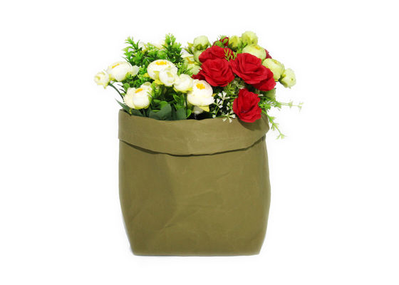 Le papier d'emballage lavable réutilisable en gros plante le sac de stockage de jouets d'organisateur de poubelles